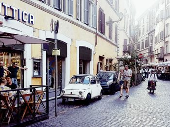 People on street in city