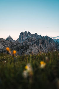 Scenic view of rocky mountains against clear sky