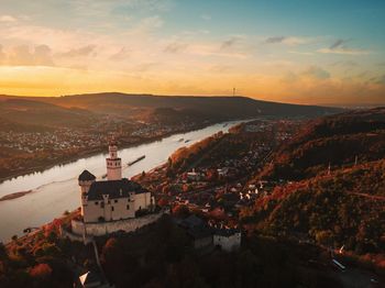 High angle view of townscape against sky during sunset