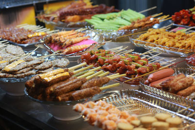 Grilled dishes like pork, okra, beef, bell pepper in ho thi ky street food, ho chi minh city