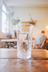 Close-up of drinking glass on table in restaurant