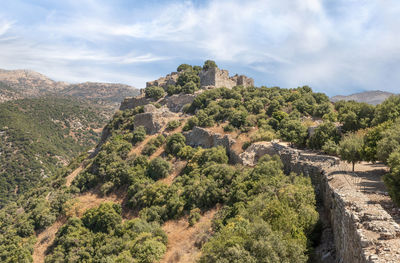 High angle view of trees and mountains against sky