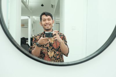 Portrait of smiling young man