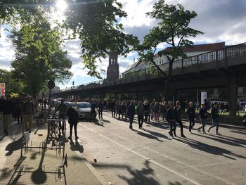 People walking on street in city