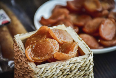 Close-up of burger in basket on table