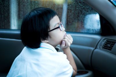 Girl sitting in car