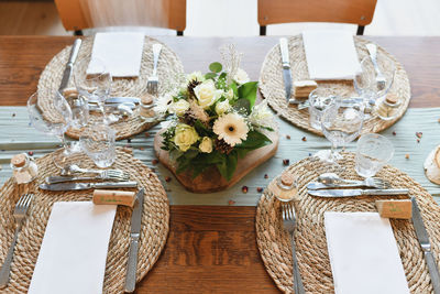 The wedding decor with a white flowers bouquet