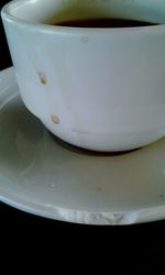 Close-up of coffee cup on table