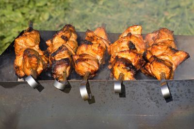 Close-up of meat on barbecue grill