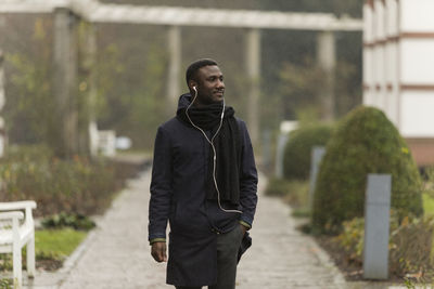 Young man standing outdoors