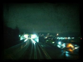 Blurred motion of cars on road at night