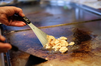 Close-up of hand holding food