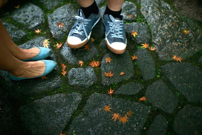 Low section of people standing on ground