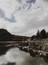 Bridge over river against sky