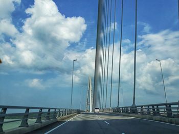 View of bridge against cloudy sky