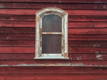 Low angle view of window of old building