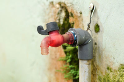 Cropped image of man standing against wall
