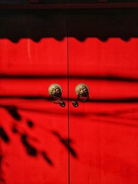 Close-up of red closed door