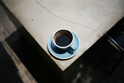 High angle view of coffee cup on table