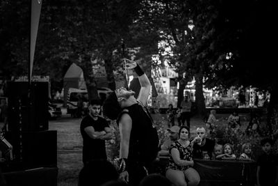 Group of people sitting outdoors