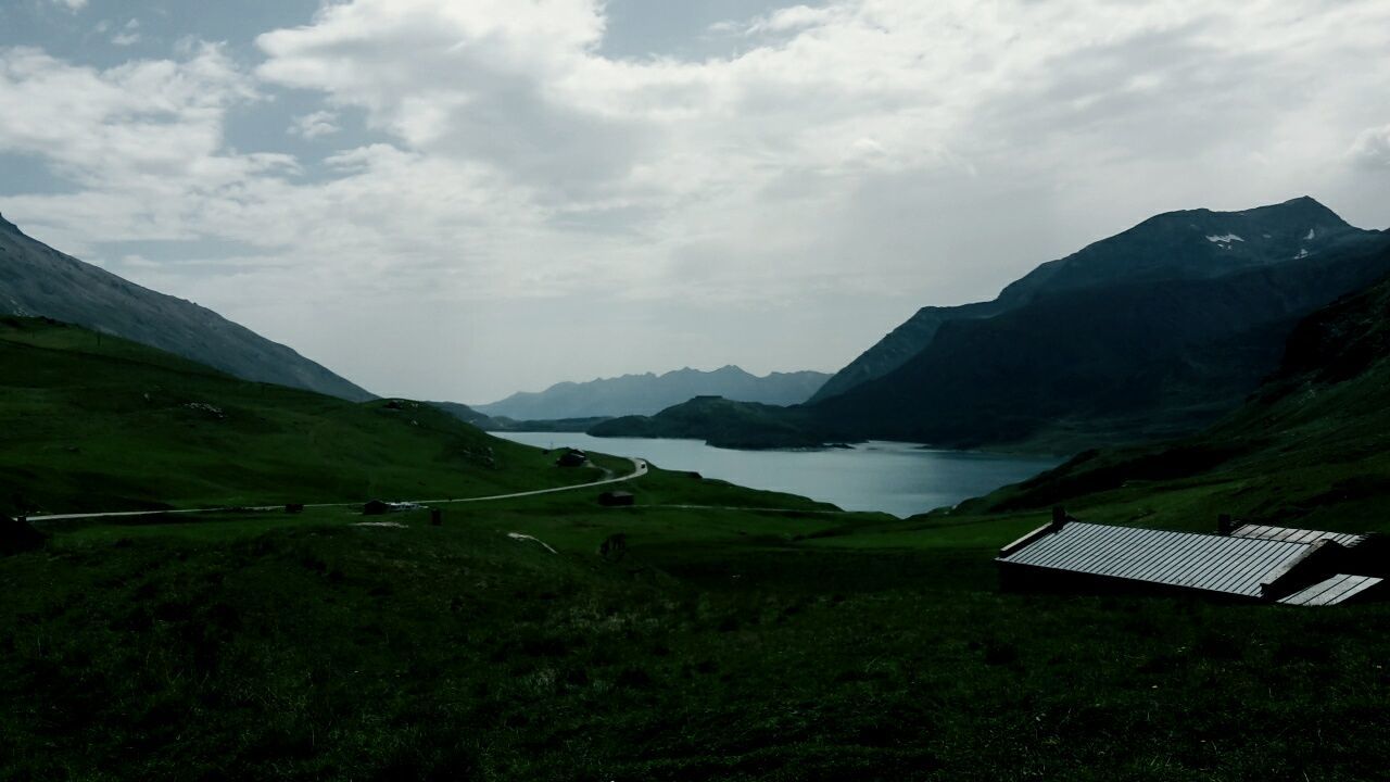 mountain, beauty in nature, nature, scenics, landscape, grass, sky, day, tranquility, outdoors, no people, tranquil scene, mountain range