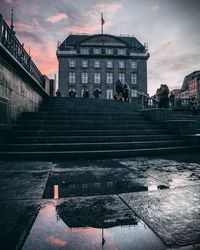 Low angle view of historical building in city against sky