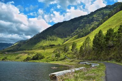 Beautiful view of lake toba on the edge of the mountains against the sky, north sumatra, indonesia