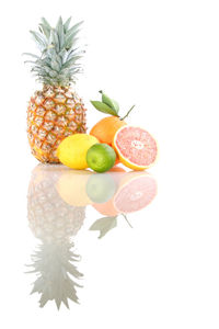 Close-up of fruit on white background