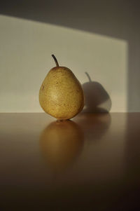 Close-up of pear on table