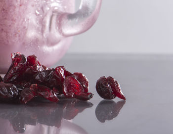 Close-up of strawberry over white background