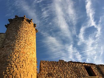 Low angle view of fort against sky