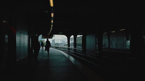 Man walking on railroad station platform