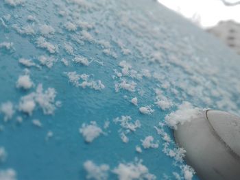 High angle view of snow on sea