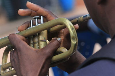 Close-up of people playing guitar