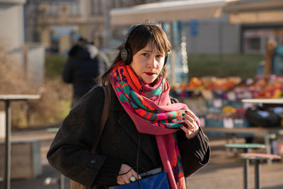 Portrait of beautiful woman standing outdoors