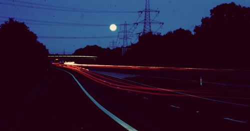 Light trails on road at night