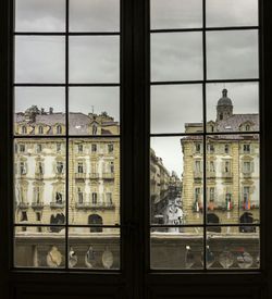 Buildings seen through window