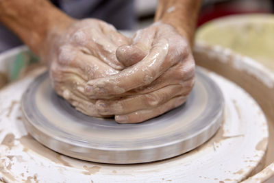 Cropped image of man working at workshop