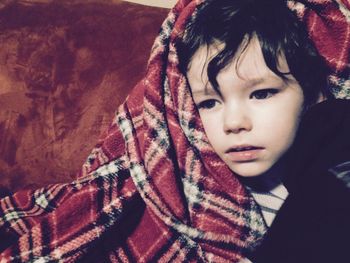 High angle view of child lying down