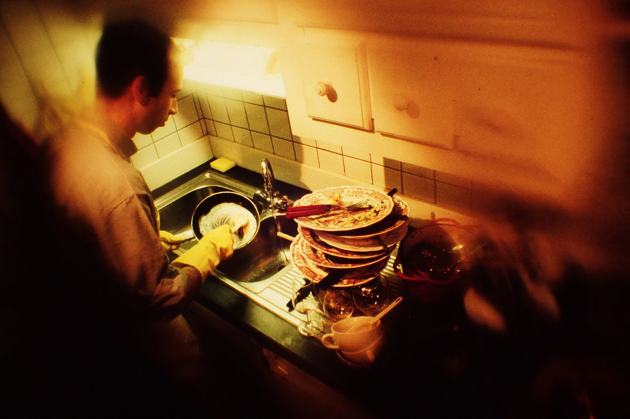 CLOSE-UP OF MAN IN TRAY