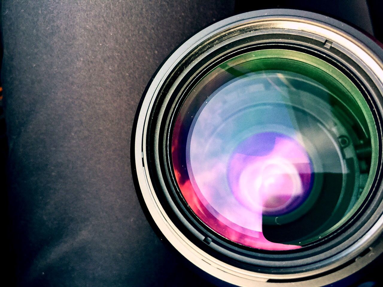 indoors, glass - material, reflection, circle, illuminated, close-up, transparent, multi colored, motion, shiny, no people, high angle view, night, glowing, geometric shape, long exposure, red, pattern, lighting equipment, glass