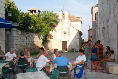 Group of people in front of building