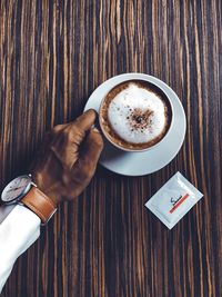 Directly above shot of coffee cup on table
