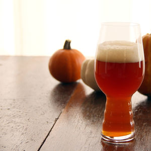 Close-up of beer glass on table