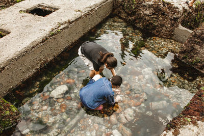 High angle view of people in lake