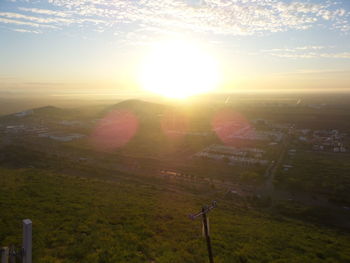 High angle view of city during sunset