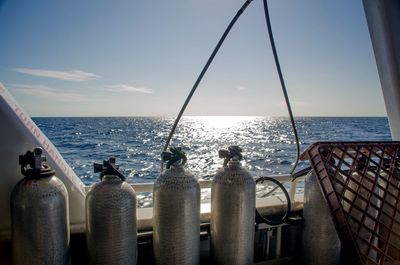 Cylinders on boat in sea