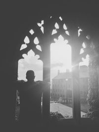 Silhouette of woman in shopping mall