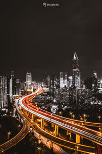 High angle view of illuminated city at night