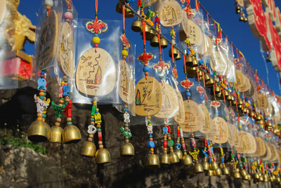 Low angle view of lanterns hanging in temple